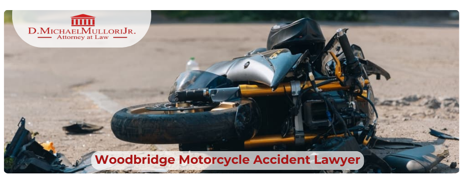 A motorcycle lies on the road after a collision in Woodbridge.